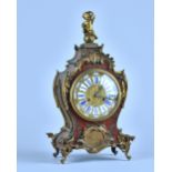 A French giltmetal-mounted Boulle work mantel clock In the Louis XV style,