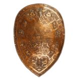 A late 19th century copper copy of the shield of Henry II of France, depicting a Roman battle scene,
