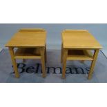 A pair of modern oak two tier bedside tables, 45cm wide x 59cm high.