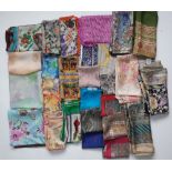 A collection of five Liberty of London printed silk scarves,