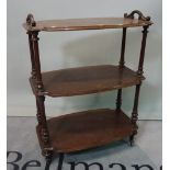 A Victorian mahogany shaped rectangular three tier what-not, 73cm wide x 98cm high.