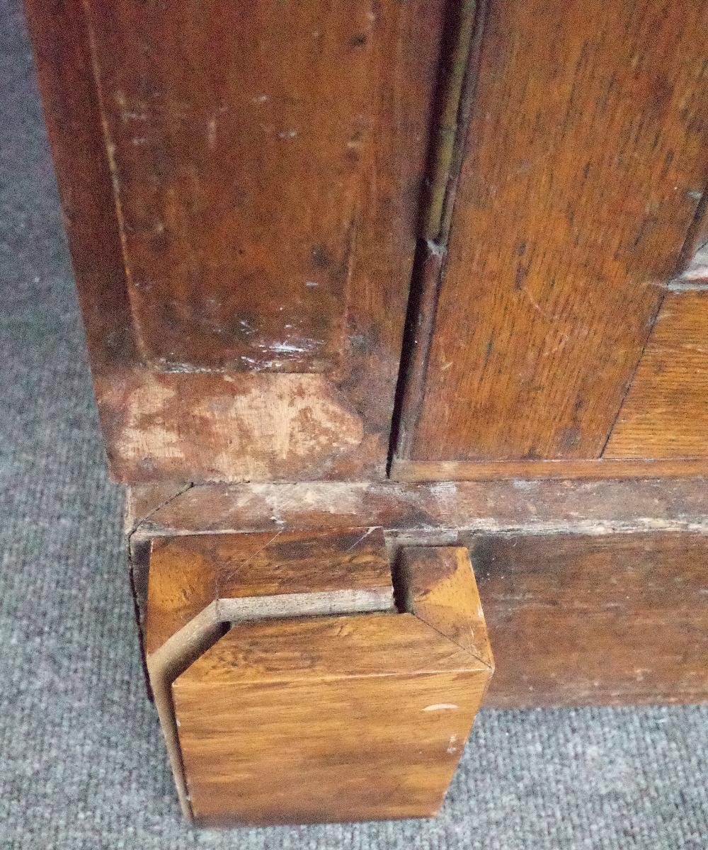 A Victorian oak Gothic revival bookcase cabinet with four arched astragal glazed doors divided by - Image 5 of 6