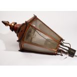 A copper lantern, of hexagonal tapering form, with frosted Perspex and pear shaped spire,