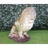 A large reconstituted stone figure of a seated lion on a square plinth, 85cm high.