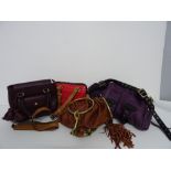 A collection of four designer handbags, comprising; a Phillip Lim 3.