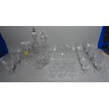 A quantity of mostly 20th century cut glass including decanters, tumblers, wine glasses and sundry,