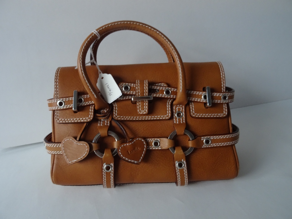 A Luella 'Giselle' tan leather handbag, with twin leather loop handles and strap decoration, - Image 9 of 10