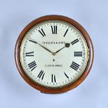 A Victorian mahogany circular Dial timepiece The 12in dial inscribed Thwaites & Reed, Clerkenwell,