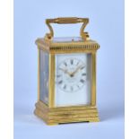 A French engraved gilt brass repeating carriage clock Retailed by James McCabe, Royal Exchange,