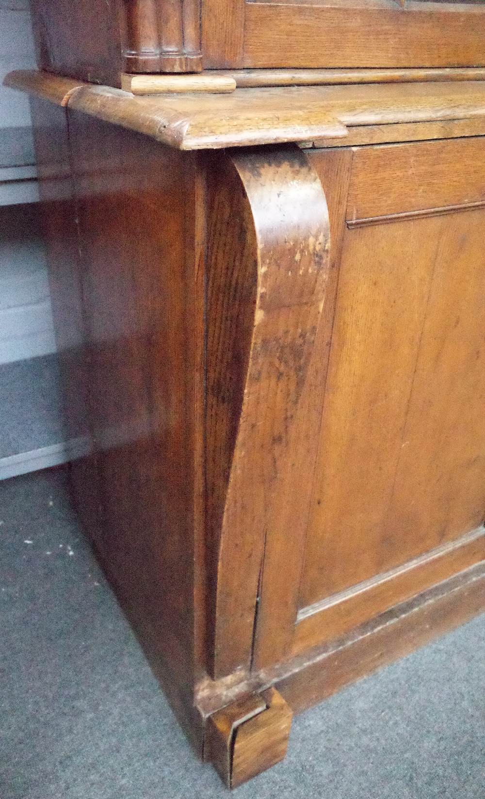 A Victorian oak Gothic revival bookcase cabinet with four arched astragal glazed doors divided by - Image 6 of 6