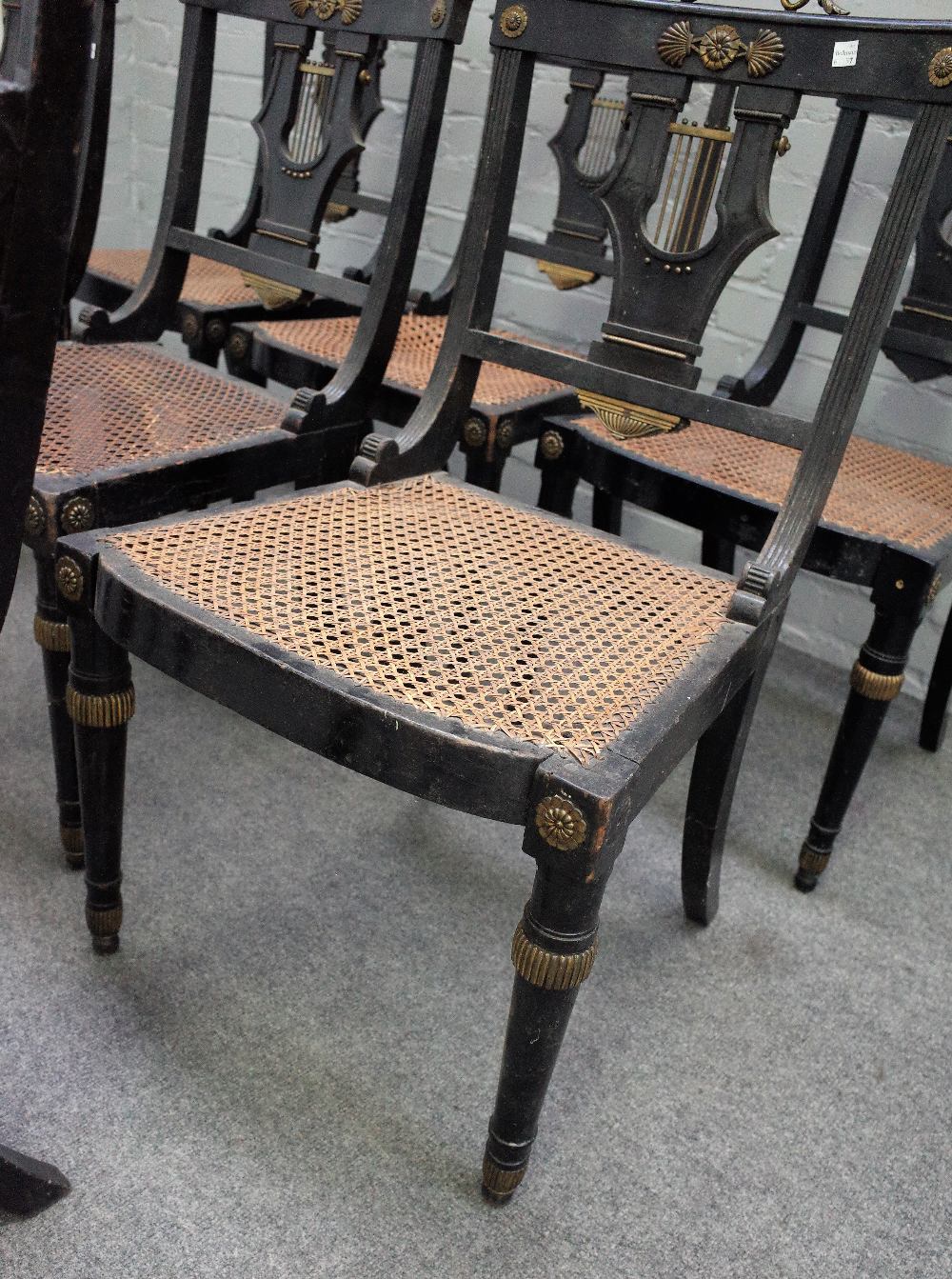 A set of eight Regency gilt metal mounted ebonised cane seat dining chairs on tapering turned - Image 3 of 5
