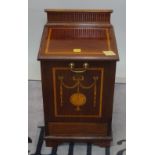 An Edwardian mahogany and inlaid coal purdonium, 38cm wide.