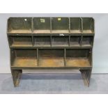 A 20th century green painted metal storage rack from a military Land Rover, 106cm wide x 92cm high.