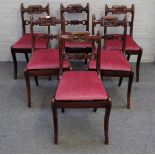 A set of six late Regency yew wood dining chairs,