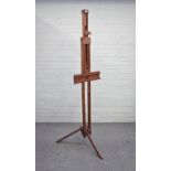 An early 20th century stained beech folding tripod artist's easel.