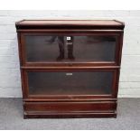 The Globe Wernicke Co Limited, a two section mahogany bookcase with up and over glazed doors,