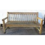 A modern hardwood garden bench, 153cm wide x 90cm high.