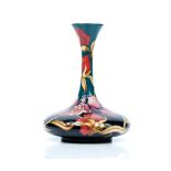 A Moorcroft vase, tube lined with flowers, by Rachel Bishop, 2006, impressed,