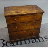 A 19th century elm chest of three long drawers on bracket feet, 72cm wide x 71cm high.