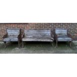 A late 19th/early 20th century cast iron and hardwood garden bench,