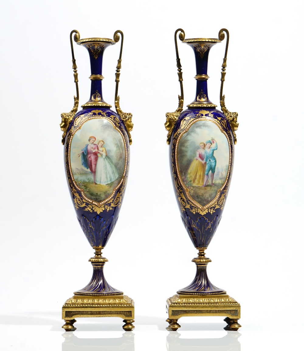 A pair of Sevres style porcelain gilt- metal mounted vases, late 19th century,