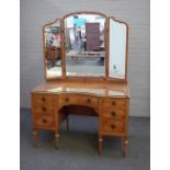 A late 19th/early 20th century satinwood dressing table,