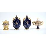 A pair of English porcelain blue-ground two-handled vases and two covers, late 19th century,