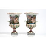 A pair of Italian Capodimonte style campana shaped two-handled urns, late 19th century,