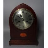 An Edwardian inlaid mahogany lancet clock on bun feet, 22cm wide x 31cm high.