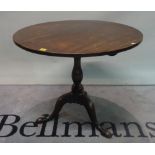 A George III mahogany circular tilt top tripod occasional table, 89cm wide x 70cm high.