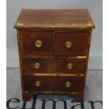 A 19th century mahogany commode converted to a side cabinet with pair of drawers,