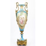 A pair of Sevres style turquoise ground gilt-metal mounted vases and covers,