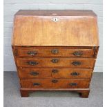 A mid-18th century featherbanded figured walnut bureau,