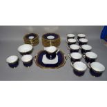 Aynsley; a part tea set with blue ground and gilt rim decoration, (qty).