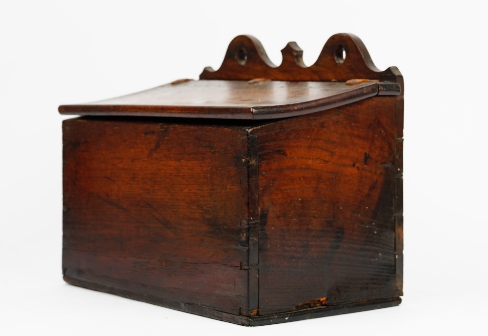 A George III oak candle box, the pierced and shaped back over a sloped front, 38cm wide x 31cm long. - Image 4 of 5