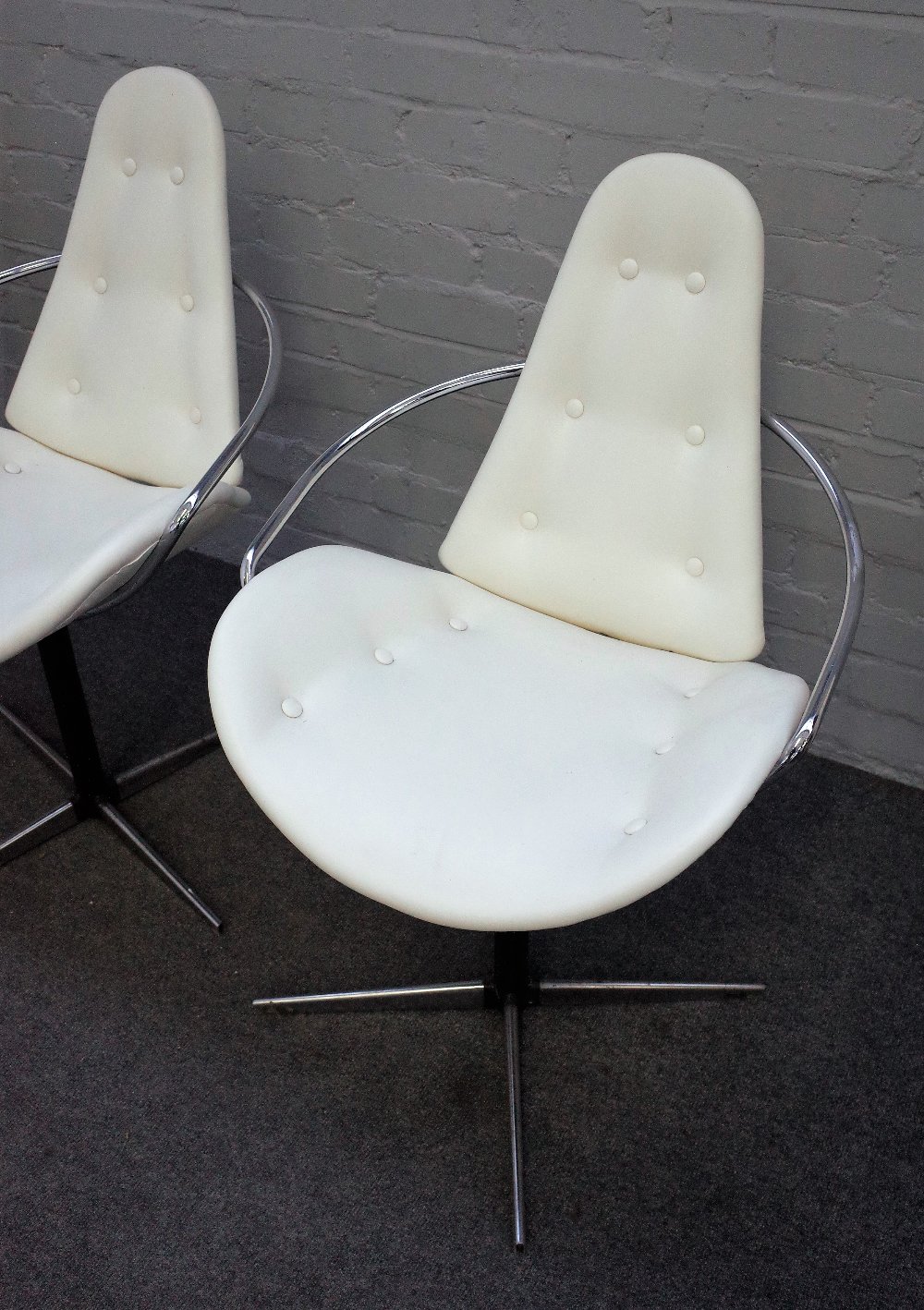 In the manner of Arne Jacobson; a set of three cream leather upholstered dining chairs, - Image 2 of 3
