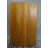 A 20th century pitch pine screen, of tambour construction, 200cm wide x 180cm high.