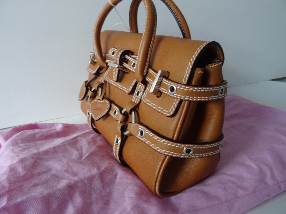 A Luella 'Giselle' tan leather handbag, with twin leather loop handles and strap decoration, - Image 4 of 10