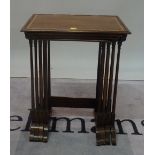 A Regency style mahogany and satinwood banded nest of four tables,