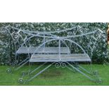 A pair of Regency style grey painted strap iron garden benches, 166cm wide x 94cm high.