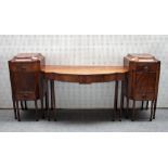 A late George III mahogany sideboard, with central bow two drawer front flanked by pedestals,