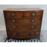 A George III mahogany bowfront chest of two short and three long graduated drawers on bracket feet,