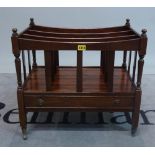 A George III style mahogany three division Canterbury with single drawer base on turned supports,