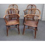 A set of three ash and elm Windsor elbow chairs, 19th century, with pierced splats,