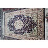 A Hereke silk and metal thread rug, Turkish,