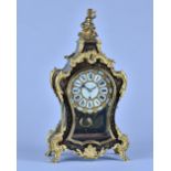 An English boulle work mantel timepiece In the Louis XV style, By Arnold, 84 Strand, London, No.