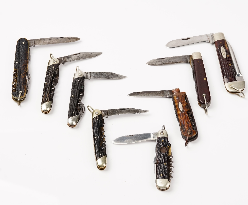 A group of eight pocket knives, mostly bone handled, including examples by Bonsa Solingen,