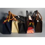 A group of five modern fabric "Pignatelli" handbags of various styles, each 28cm wide x 20cm high,