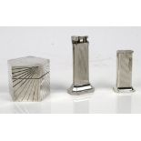 A Dunhill Tallboy silver plated table lighter, the underside numbered 18583,