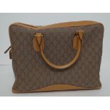 A Gucci GG lady's canvas and tan leather soft briefcase,